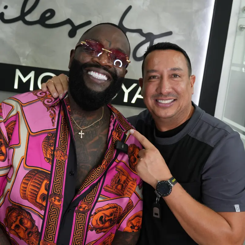 Dr. Mario Montoya with the client Rick Ross