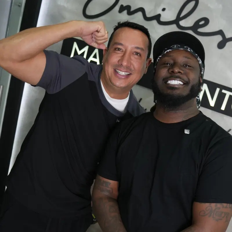 Dr. Mario Montoya with the client T-Pain